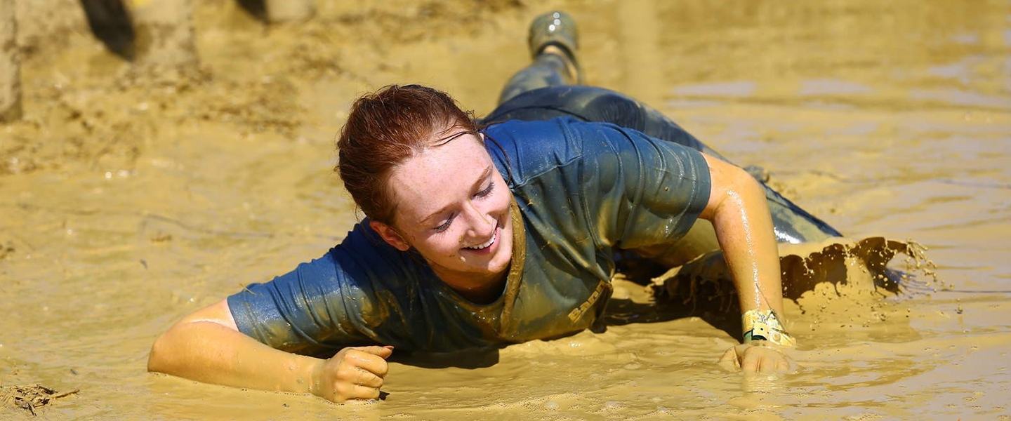 Henry Boot Construction employee Lydia McGuiness proceeding through one of the many obstacles throughout the race