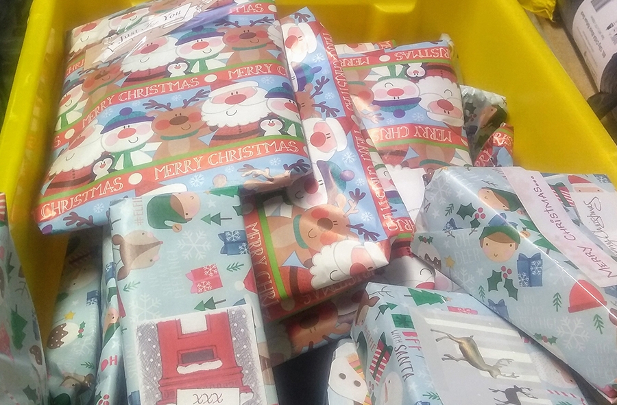 The presents are wrapped for Santa to give to the children